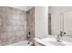 Clean bathroom with tile shower and vanity at 2709 Richmond Row Dr, Suwanee, GA 30024