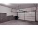 Attached garage with automatic opener and extra storage at 2709 Richmond Row Dr, Suwanee, GA 30024
