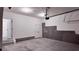 Garage with extra storage and access door at 2709 Richmond Row Dr, Suwanee, GA 30024
