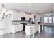 Modern kitchen with stainless steel appliances and granite countertops at 2709 Richmond Row Dr, Suwanee, GA 30024