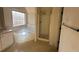 Bright bathroom featuring a corner tub and shower at 4010 Peachtree Farms Rd, Rex, GA 30273