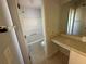 Bathroom with vanity, bathtub, and tiled floor at 4010 Peachtree Farms Rd, Rex, GA 30273