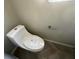 Clean toilet and floor in a small bathroom at 4010 Peachtree Farms Rd, Rex, GA 30273