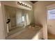 Large bathroom with double vanity and garden tub at 4010 Peachtree Farms Rd, Rex, GA 30273