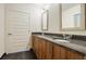 Bathroom featuring double sinks and granite countertops at 1080 Peachtree Ne St # 1304, Atlanta, GA 30309