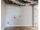 Unfinished basement space featuring laminate flooring, ready for customization at 2976 Bay Berry Sw Dr, Marietta, GA 30008