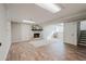 Spacious finished basement with a brick fireplace, neutral walls, and ample lighting at 2976 Bay Berry Sw Dr, Marietta, GA 30008