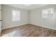 Bedroom featuring wood flooring and natural light at 2976 Bay Berry Sw Dr, Marietta, GA 30008