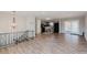 Open concept living room and kitchen with wood-look flooring and lots of natural light at 2976 Bay Berry Sw Dr, Marietta, GA 30008