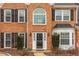 Brick front entryway with a large arched window and a double door at 4334 Martingale Nw Ln, Acworth, GA 30101