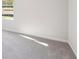 Bright bedroom with carpeted floor and lots of sunshine at 11831 Rizvan Pl, Covington, GA 30014