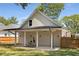 Covered patio with ceiling fan, concrete flooring and sitting area at 199 Racine Sw St, Atlanta, GA 30314