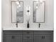Elegant bathroom with double sinks, sleek fixtures, and modern lighting beneath mirrors at 199 Racine Sw St, Atlanta, GA 30314