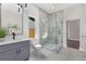 Contemporary bathroom with gray vanity and walk-in shower at 199 Racine Sw St, Atlanta, GA 30314