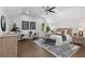 Spacious bedroom with wood floors, large bed, and sitting area at 199 Racine Sw St, Atlanta, GA 30314