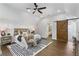 Bright bedroom featuring a cozy bed and barn door at 199 Racine Sw St, Atlanta, GA 30314