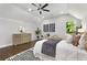 Spacious primary bedroom with hardwood floors and a ceiling fan at 199 Racine Sw St, Atlanta, GA 30314
