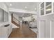 Bright and airy entryway with hardwood floors and view into the living area at 199 Racine Sw St, Atlanta, GA 30314