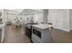 Island stove and oven in spacious kitchen overlooking dining and living room at 199 Racine Sw St, Atlanta, GA 30314