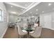 Well-lit dining area flowing into living room with statement wall at 199 Racine Sw St, Atlanta, GA 30314