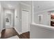 Clean and bright hallway with hardwood floors and access to patio at 2479 Peachtree Rd # 101, Atlanta, GA 30324