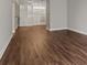 Spacious living room with hardwood floors and built-in shelving at 2479 Peachtree Rd # 101, Atlanta, GA 30324