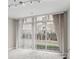 Bright living room featuring large windows and city views at 2479 Peachtree Rd # 101, Atlanta, GA 30324