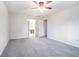 Bedroom with carpet flooring and door to bathroom at 4147 Azalea Ct, Snellville, GA 30039