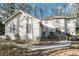 Two story house exterior, featuring a light colored stucco exterior, walkway and landscaping at 4147 Azalea Ct, Snellville, GA 30039