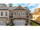 New brick townhome with attached two-car garage at 502 Winston Croft Cir # 53, Johns Creek, GA 30022