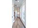 Bright hallway features hardwood floors, built-in cabinets, and multiple windows with views at 502 Winston Croft Cir # 53, Johns Creek, GA 30022