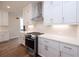 New kitchen with stainless steel appliances, quartz countertops, and white cabinets at 502 Winston Croft Cir # 53, Johns Creek, GA 30022