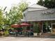 Exterior of 'one 41' restaurant with outdoor patio seating and visible landscaping at 502 Winston Croft Cir # 53, Johns Creek, GA 30022