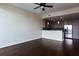 Spacious living room with hardwood floors and kitchen view at 1080 Peachtree Ne St # 2716, Atlanta, GA 30309