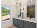 Modern bathroom with dual vanity, quartz countertop and large mirrors at 1432 Mims Sw St, Atlanta, GA 30314