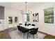 Bright dining room with modern chandelier and access to backyard at 1432 Mims Sw St, Atlanta, GA 30314