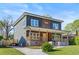 Charming two-story home with a covered front porch and well-maintained lawn at 1432 Mims Sw St, Atlanta, GA 30314