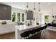 Modern kitchen with gray cabinets, white countertops, and a large island at 1432 Mims Sw St, Atlanta, GA 30314