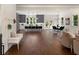 Open floor plan with hardwood floors, neutral colors, and comfortable seating at 1432 Mims Sw St, Atlanta, GA 30314