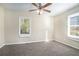 Large bedroom with neutral carpeting and ample natural light at 1603 Hollyhock Ter, Decatur, GA 30032