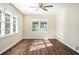 Bright living room featuring hardwood floors and large windows at 1603 Hollyhock Ter, Decatur, GA 30032