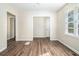 Spacious living room with hardwood floors and neutral walls at 1603 Hollyhock Ter, Decatur, GA 30032