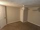 Simple bedroom with ceiling fan and neutral wall color at 2455 Lake Harbin Rd, Morrow, GA 30260