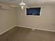 Bright bedroom with ceiling fan and neutral wall color at 2455 Lake Harbin Rd, Morrow, GA 30260