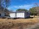 Cozy cottage with sunroom and deck at 2455 Lake Harbin Rd, Morrow, GA 30260