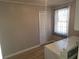 Laundry room with washer, dryer, and built-in storage at 2455 Lake Harbin Rd, Morrow, GA 30260
