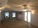 Sunlit living room with high ceilings and access to outdoors at 2455 Lake Harbin Rd, Morrow, GA 30260