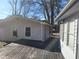 Two storage sheds, one with gray siding, one white at 2455 Lake Harbin Rd, Morrow, GA 30260