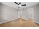 Bedroom view showcasing natural light, wood floors, and ceiling fan at 3066 Chastain Park Ne Ct, Atlanta, GA 30342