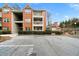 Brick building with parking and balconies at 3066 Chastain Park Ne Ct, Atlanta, GA 30342